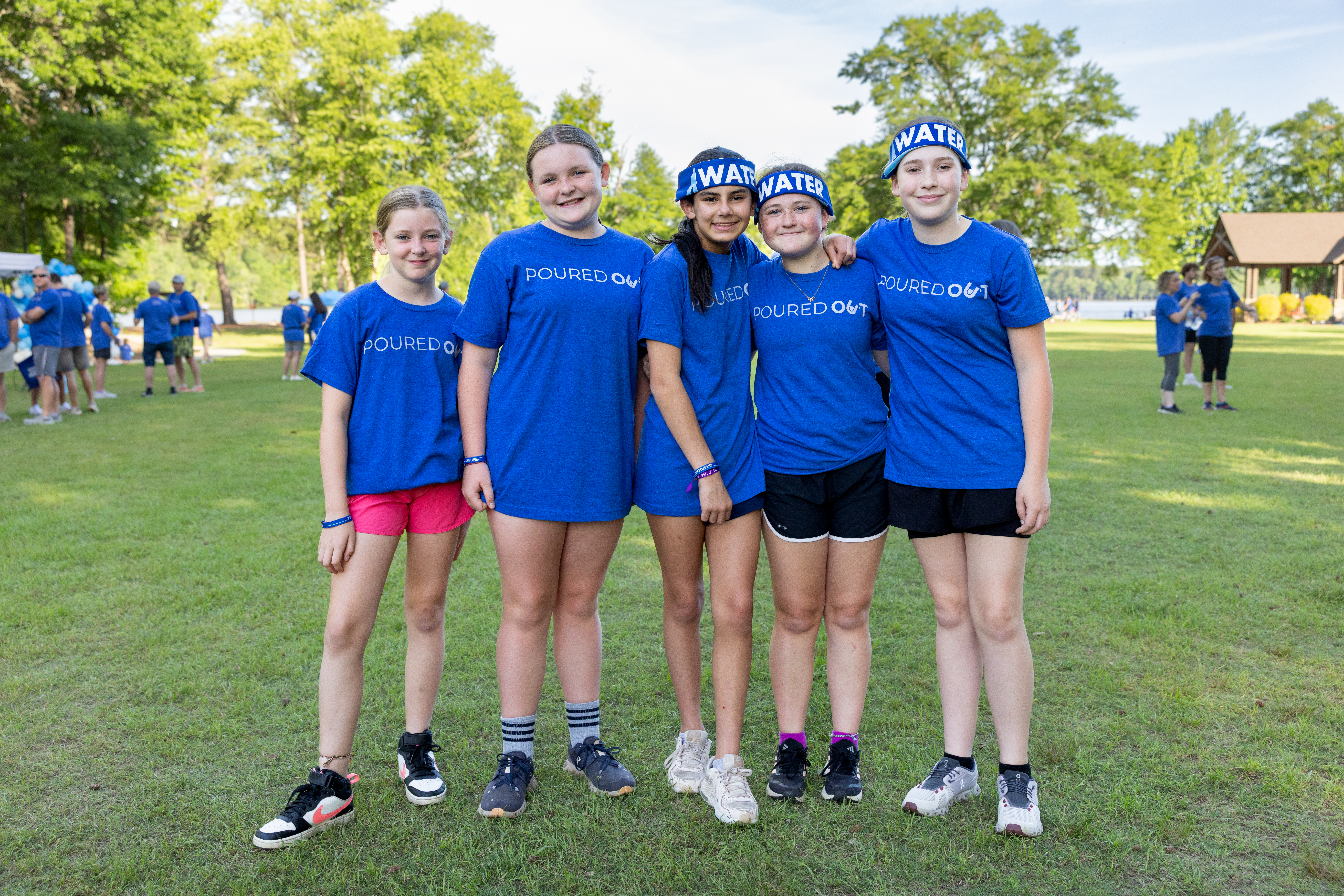 group of tween girls at an outdoor fundraiser event