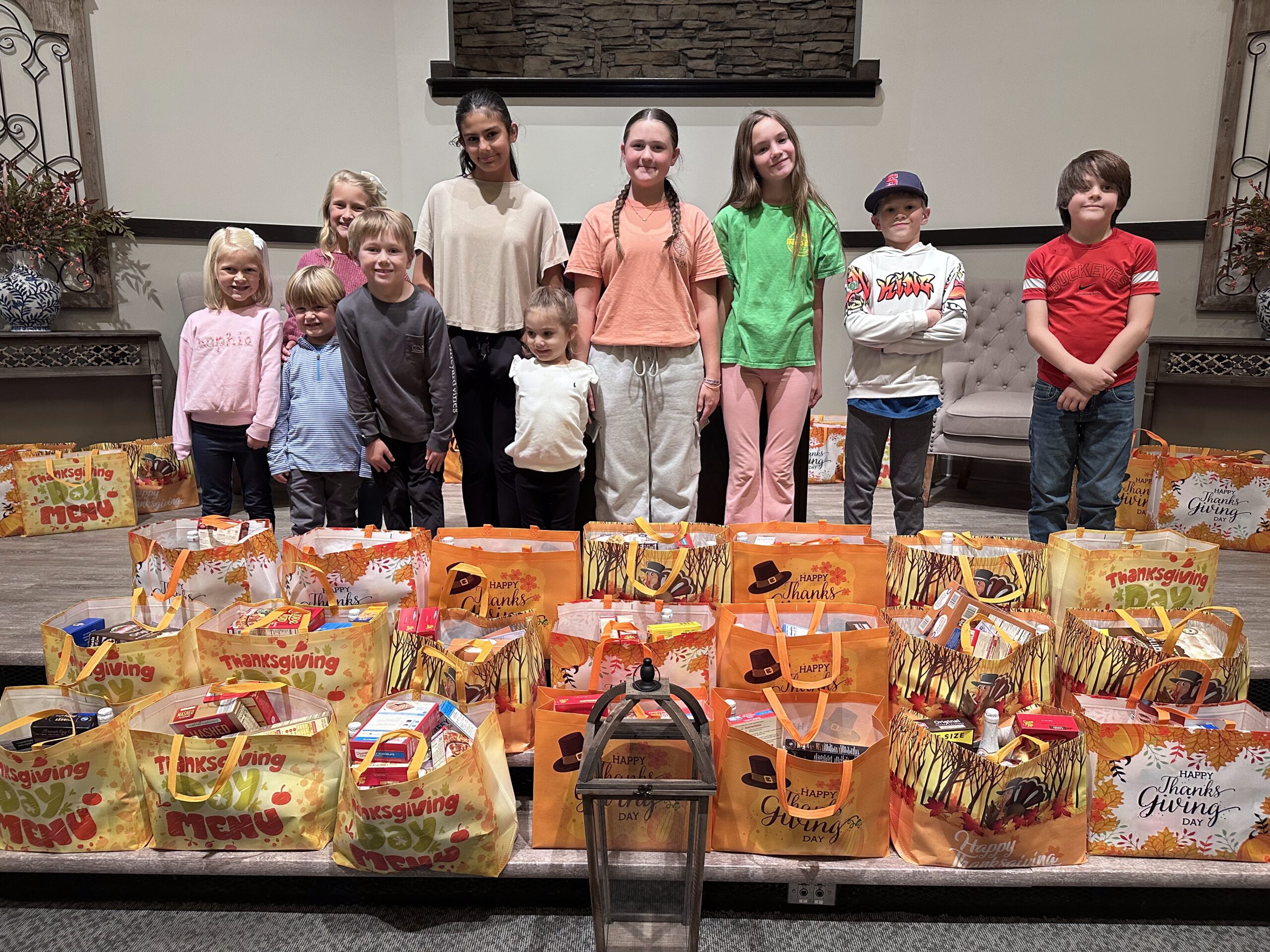 group of kids at a thanksgiving service project at peachtree city church of christ